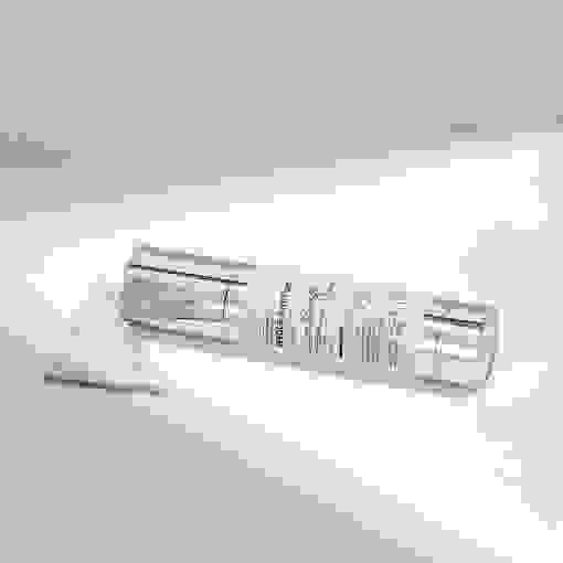 VT Reedle Shot 300 bottle beside product texture, showcasing lightweight formula with micro-needle technology.