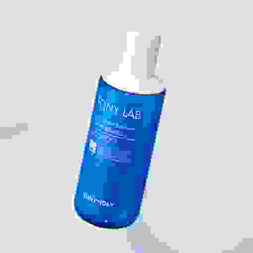 TONYMOLY AC Control Emulsion 160ml styled with minimal skincare elements, highlighting its acne-care and soothing properties.