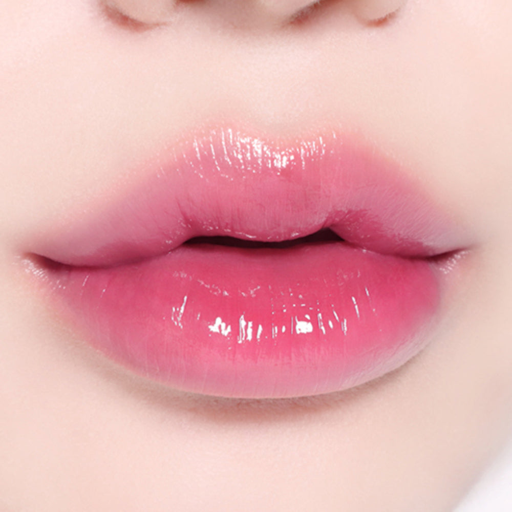 Soft pink BBIA L'eau Tint 4.5g on lips, showcasing a subtle, glossy finish perfect for a natural makeup look.