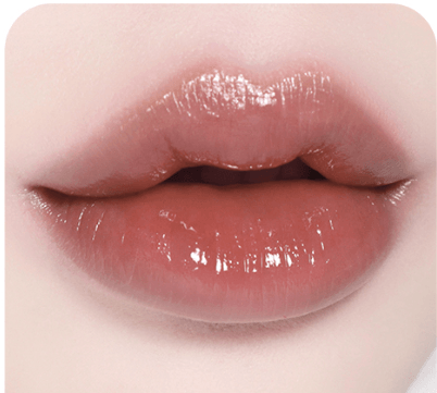 BBIA L'eau Tint 4.5g in a rich mauve shade on lips, delivering a polished, glossy look with long-lasting hydration.