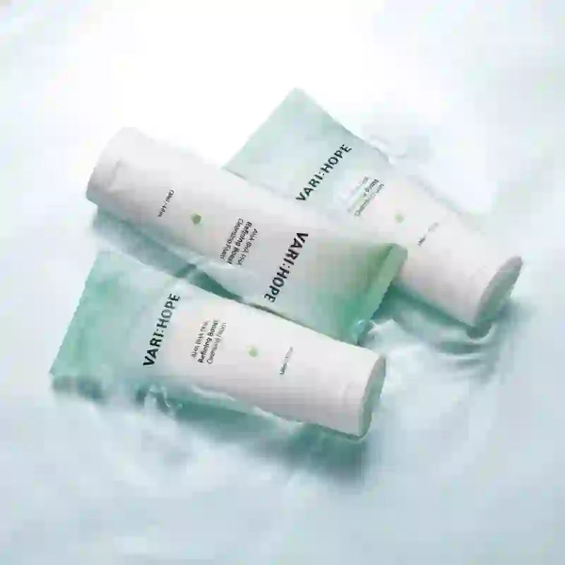 VARIHOPE Pore Deep Cleansing Foam tubes displayed on a serene water background, showcasing skincare effectiveness.