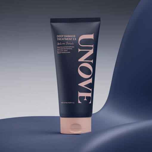UNOVE Hair Treatment - Damage Repair | Keratin-PF 320ml conditioner displayed on modern chair, designed for deep conditioning and shine enhancement.