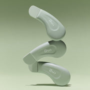 Three ilso Deep Clean Master/Blackhead Remover Tools stacked artistically, showcasing sleek design and compact skincare tool for blackhead removal.