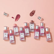 BBIA L'eau Tint 4.5g in 9 colors displayed on a pink background with open applicators showing glossy texture. Ideal for vibrant, weightless lip color.