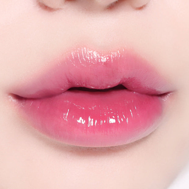 Soft pink BBIA L'eau Tint 4.5g on lips, showcasing a subtle, glossy finish perfect for a natural makeup look.
