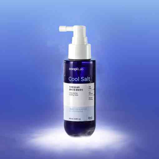 Dr.G Doopi Lab Cool Salt Hair Tonic 100ml shown upright with mist effect, highlighting its long-lasting cooling and scalp revitalizing formula.